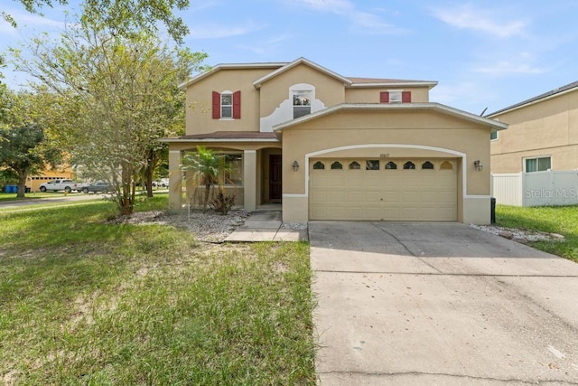 front of property with a front lawn and a garage