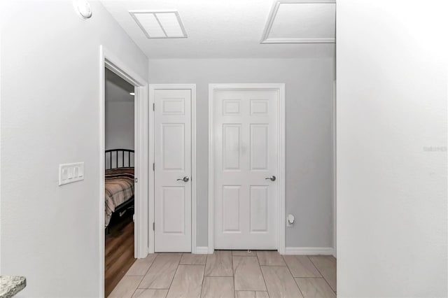 hallway featuring light hardwood / wood-style flooring