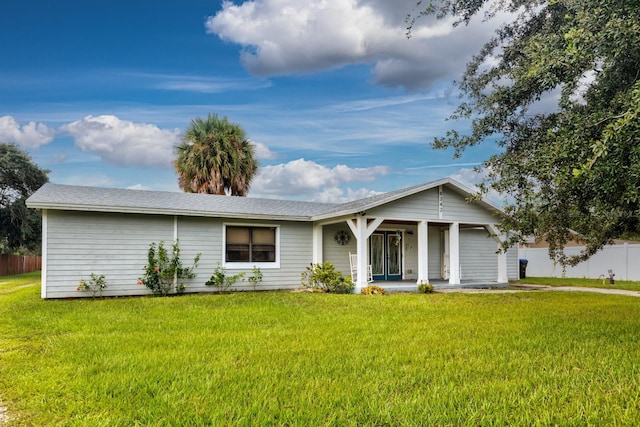 ranch-style house featuring a front lawn