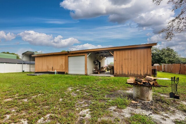 view of outdoor structure featuring a yard