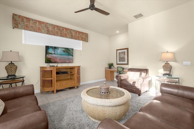 living room with ceiling fan and light tile patterned floors