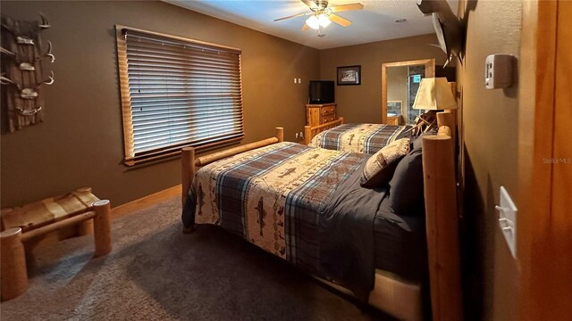 bedroom featuring carpet and ceiling fan