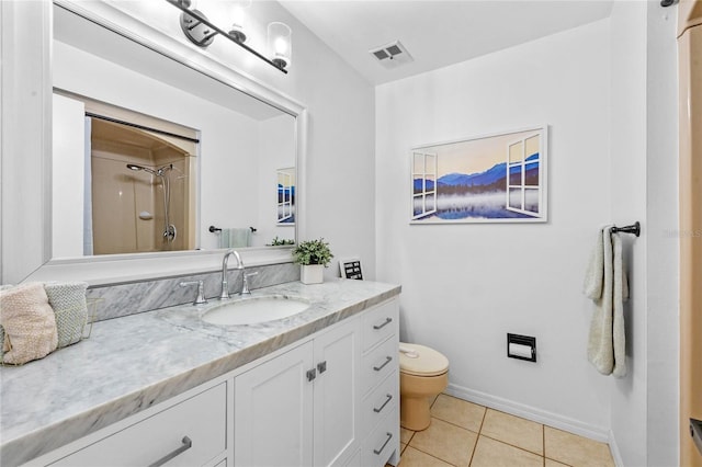 bathroom with visible vents, toilet, a shower with shower door, tile patterned flooring, and vanity