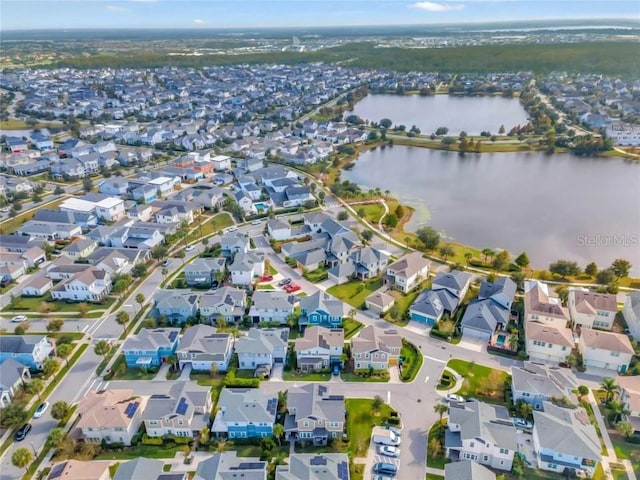 bird's eye view with a water view