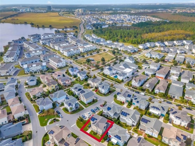 bird's eye view with a water view