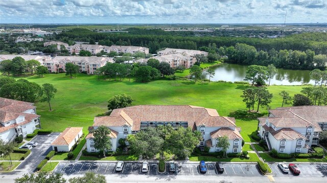 drone / aerial view with a water view