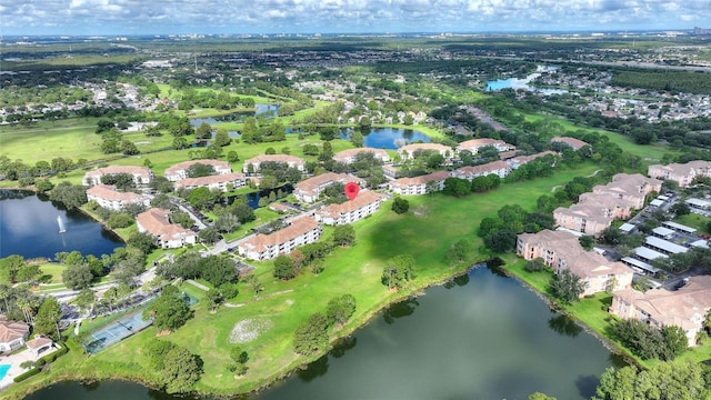 drone / aerial view with a water view