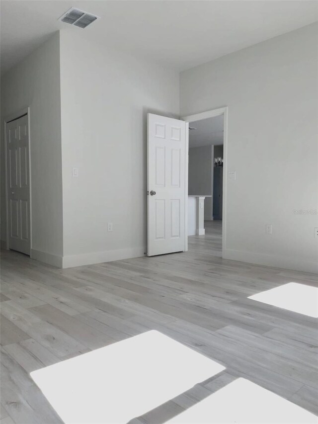 empty room featuring light hardwood / wood-style flooring