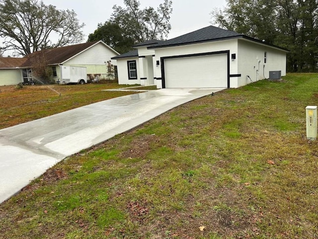 single story home with a garage, central AC unit, and a front lawn