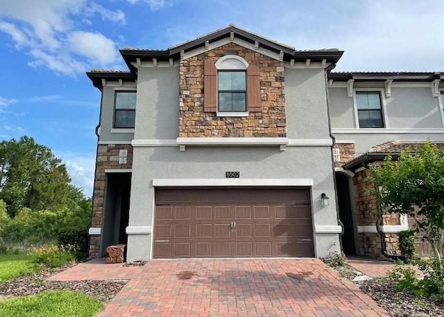 view of front of home with a garage