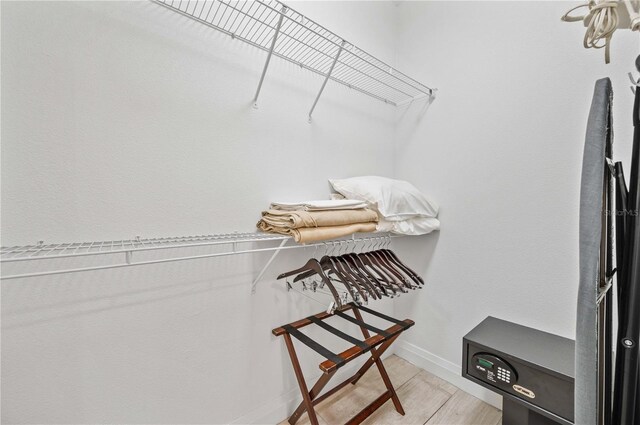 spacious closet featuring light wood-type flooring