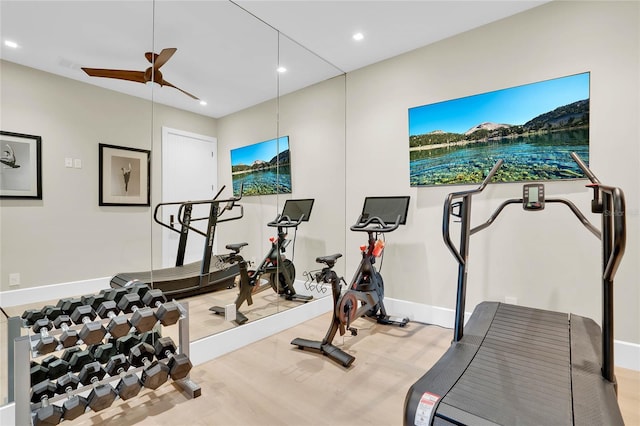 exercise room with ceiling fan