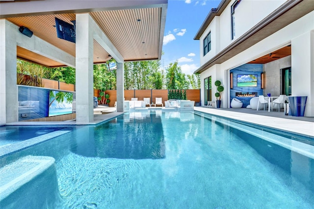 view of pool featuring a patio area