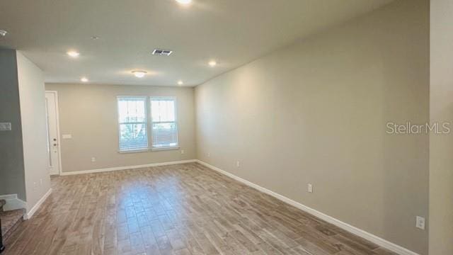 empty room featuring light wood-type flooring