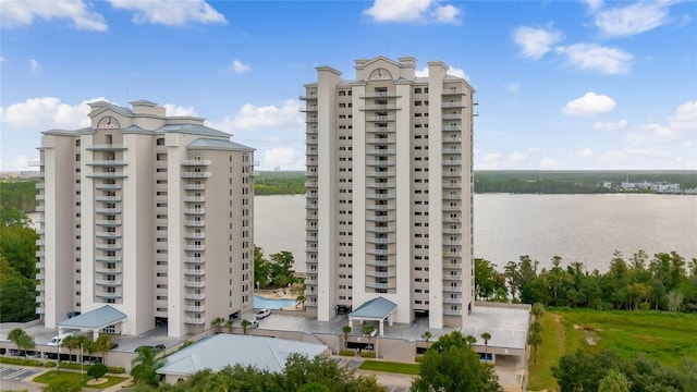 view of building exterior with a water view