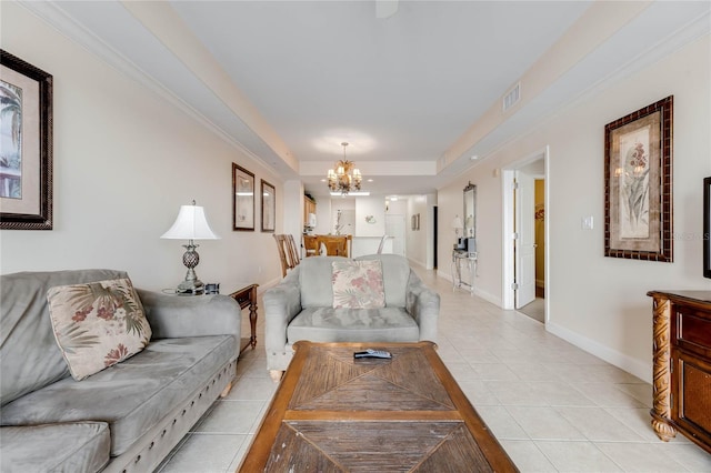 living room featuring light tile patterned floors and an inviting chandelier