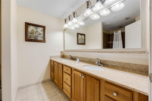 bathroom with vanity, a shower with curtain, and tile patterned floors