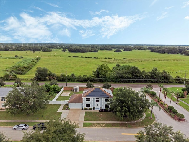 birds eye view of property featuring a rural view