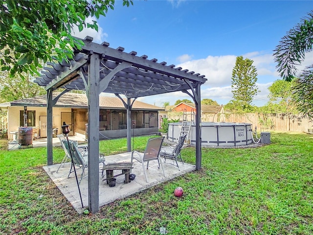 exterior space with a fenced in pool, a patio, and a pergola