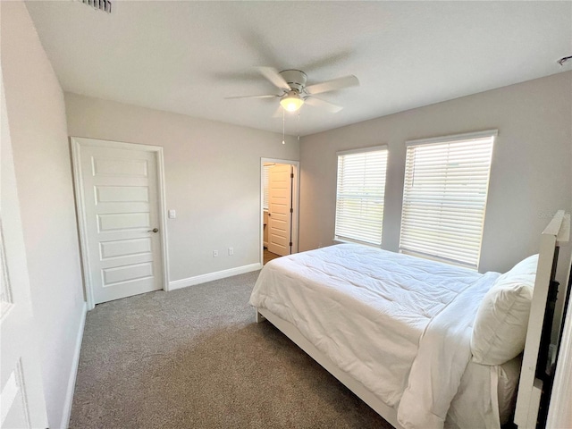 bedroom featuring carpet floors, a ceiling fan, and baseboards