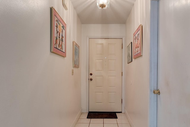 entryway featuring light tile patterned floors