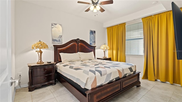 tiled bedroom with ceiling fan