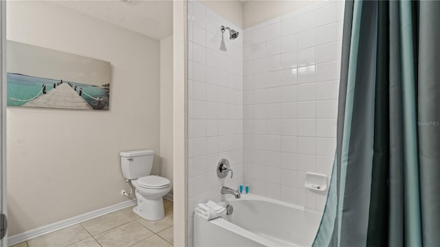 bathroom featuring a textured ceiling, toilet, tile patterned floors, and shower / bath combo with shower curtain