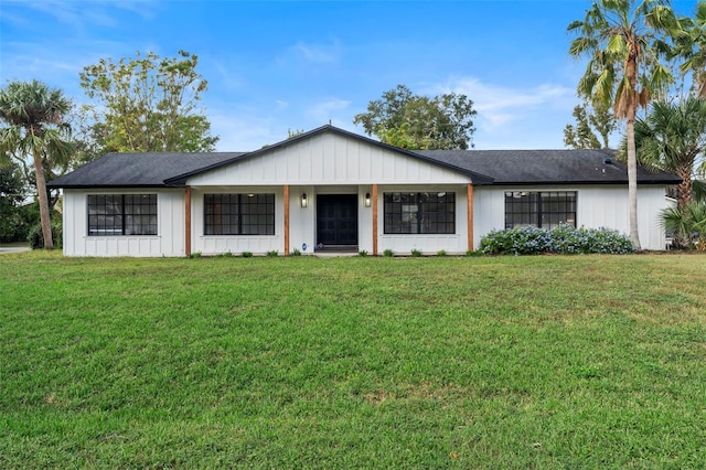 ranch-style house with a front lawn