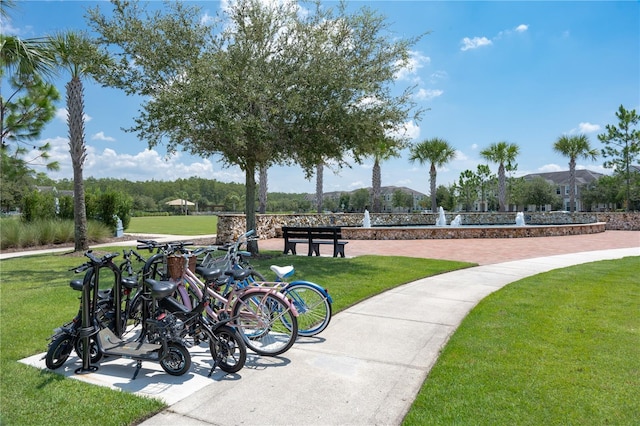 view of home's community featuring a lawn