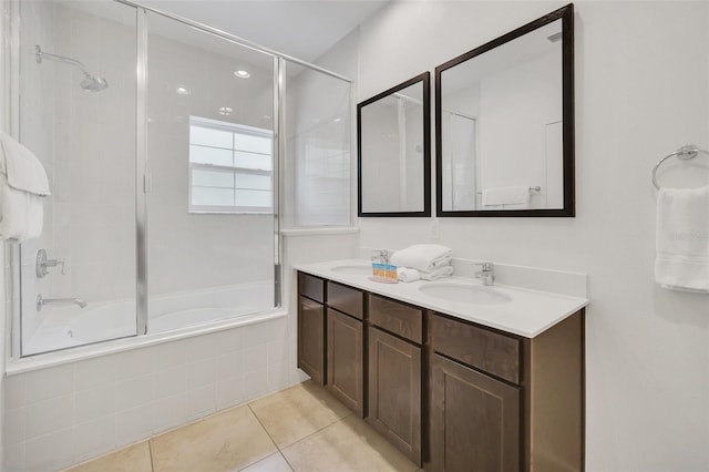 bathroom featuring shower / bath combination with glass door, vanity, and tile patterned flooring