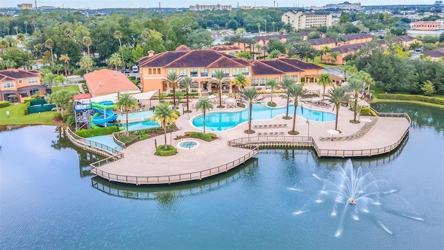 bird's eye view with a water view