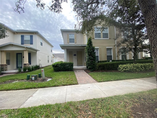 view of front facade with a front yard