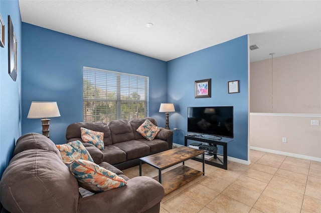 living room with light tile patterned floors