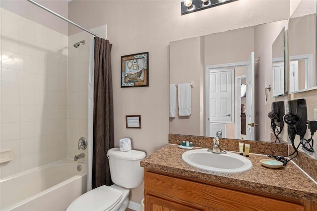 full bathroom with shower / bath combination with curtain, toilet, and vanity