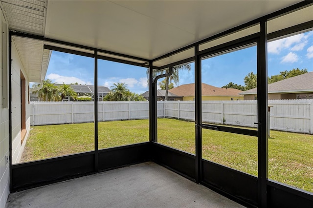 unfurnished sunroom featuring a healthy amount of sunlight