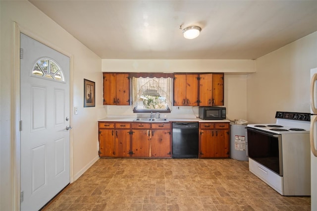 kitchen with electric water heater, black appliances, and sink