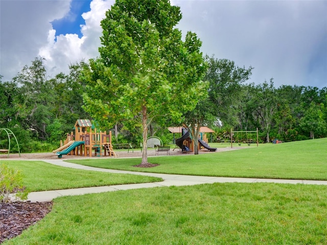 view of play area featuring a lawn