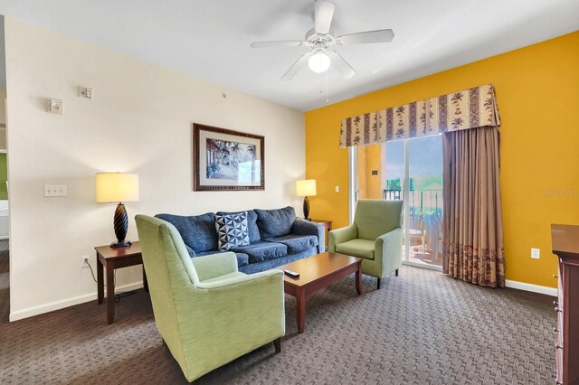 living room with carpet flooring and ceiling fan