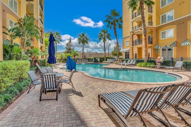 view of swimming pool featuring a patio