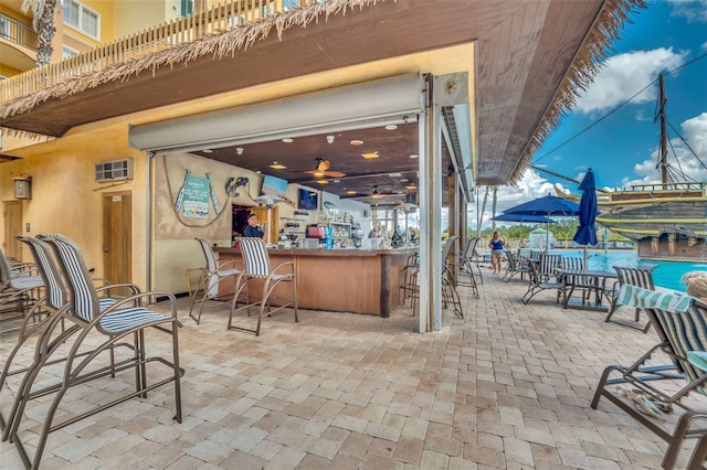 view of patio featuring outdoor dry bar