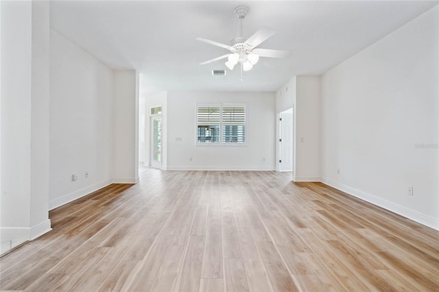 unfurnished living room with light hardwood / wood-style flooring and ceiling fan