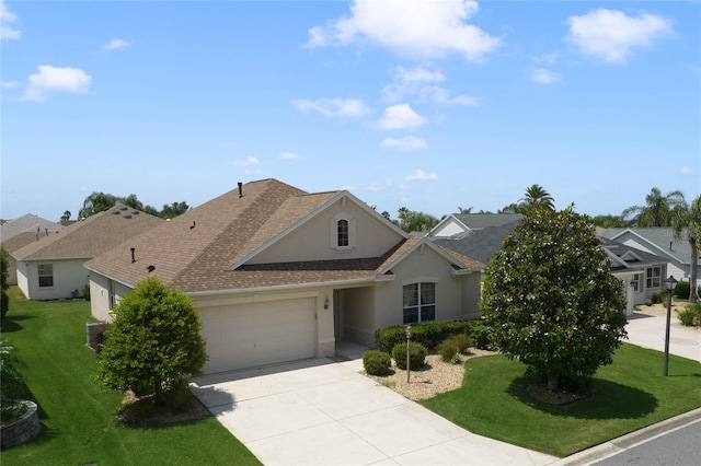 view of front facade with a garage and a front yard