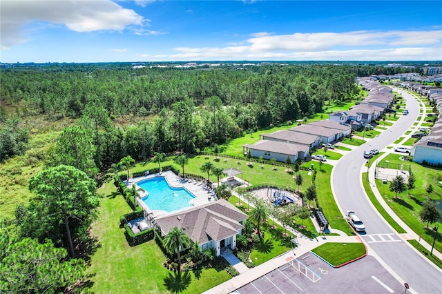 bird's eye view featuring a forest view