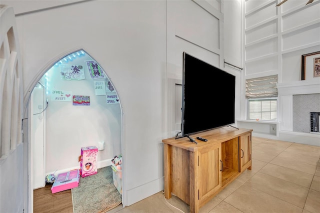 interior space with light tile patterned floors