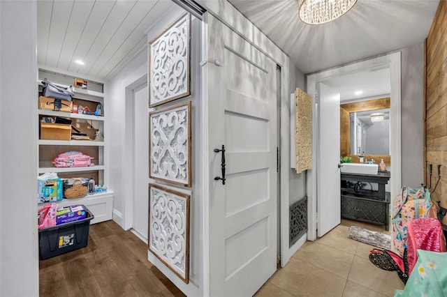 entrance foyer with hardwood / wood-style flooring and sink