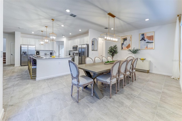 dining space with sink