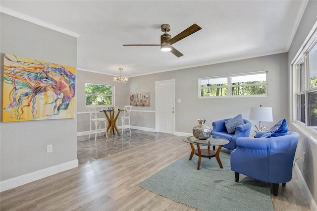 living room featuring a wealth of natural light and light hardwood / wood-style flooring