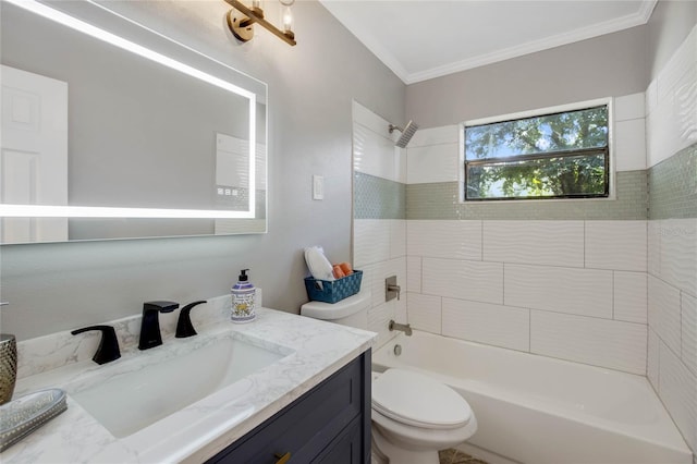 full bathroom with tiled shower / bath, toilet, and vanity