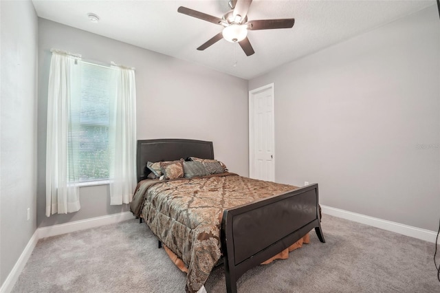 bedroom with carpet flooring and ceiling fan