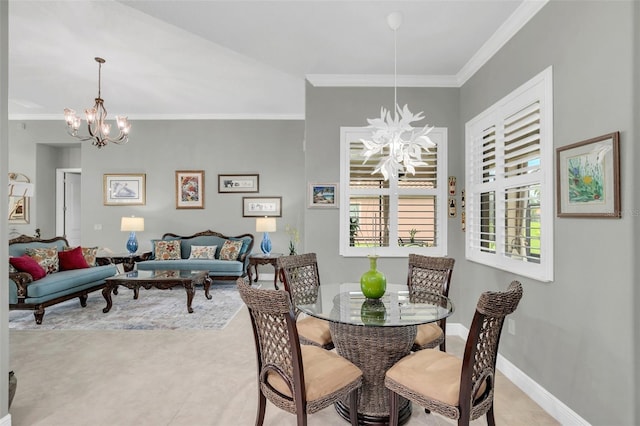 dining space featuring crown molding and a chandelier